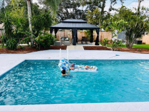 Tropical Oasis near Beaches! 4BR, Heated Pool, Fire Pit, Grill and More